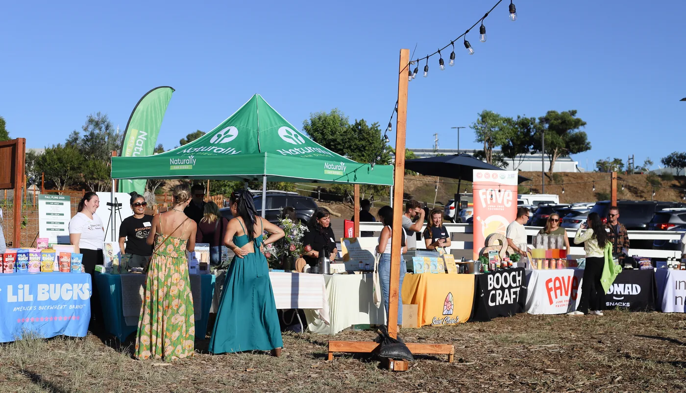 Naturally San Diego members at an outdoor natural products marketplace